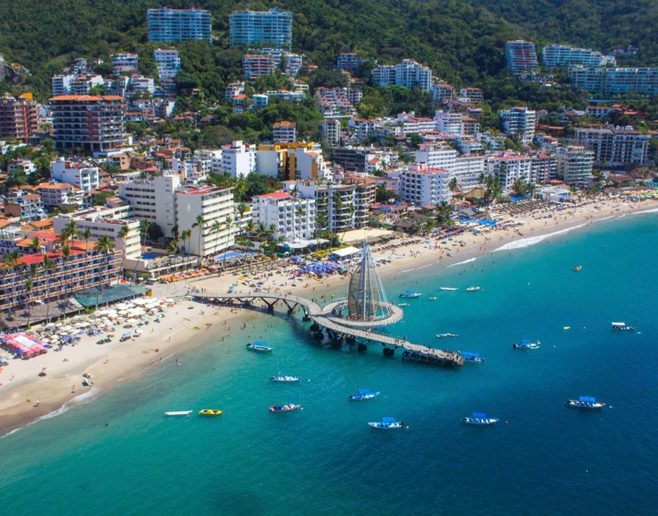 Aerial view of Los Muertos Beach in Puerto Vallarta where La Terraza Inn Hotel is located